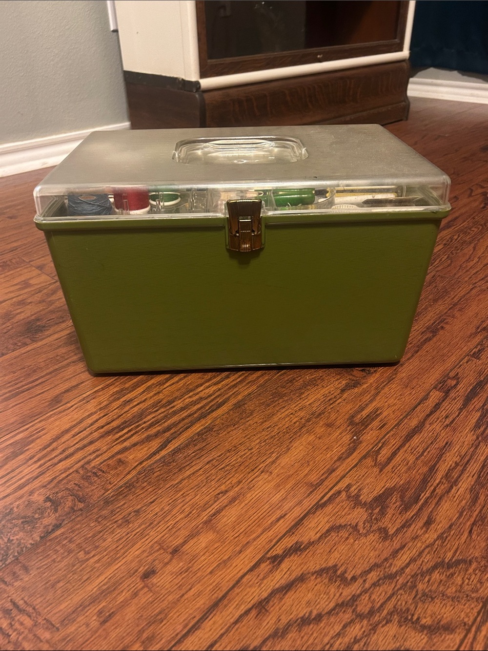 Vgt Olive Green sewing Box with Clear Lid w all contents shown.